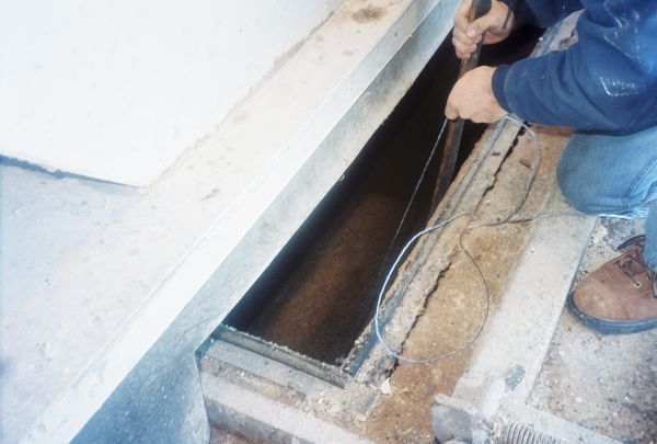 2/10 The trinity River plant personal allowed a sample collection vessel to sink into the grease seperator to pull up a sample