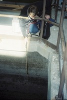 2/6 Applying OSE II down 15 feet to the waste, grease and oil covered inlet surface from a second area at the Trinity River Waste Treatment plant